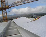 Hard Hats Prodex Insulation on Roof of Building